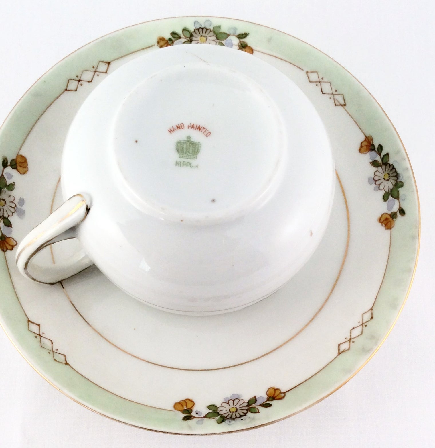 Nippon Tea Cup And Saucer